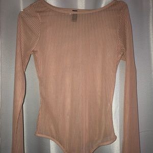 Sheer beige body suit